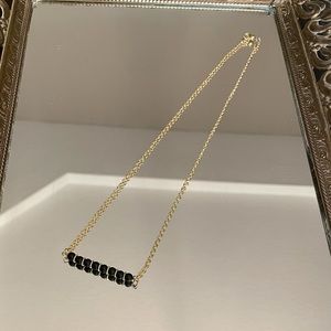 Handmade black and gold necklace
